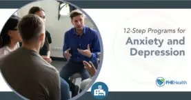People sitting in a circle talking and following the Emotions Anonymous 12-step program for anxiety and depression
