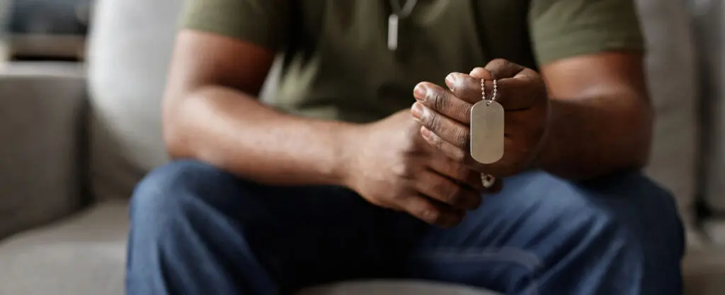 Military identification tags representing veterans entering treatment at FHE Health