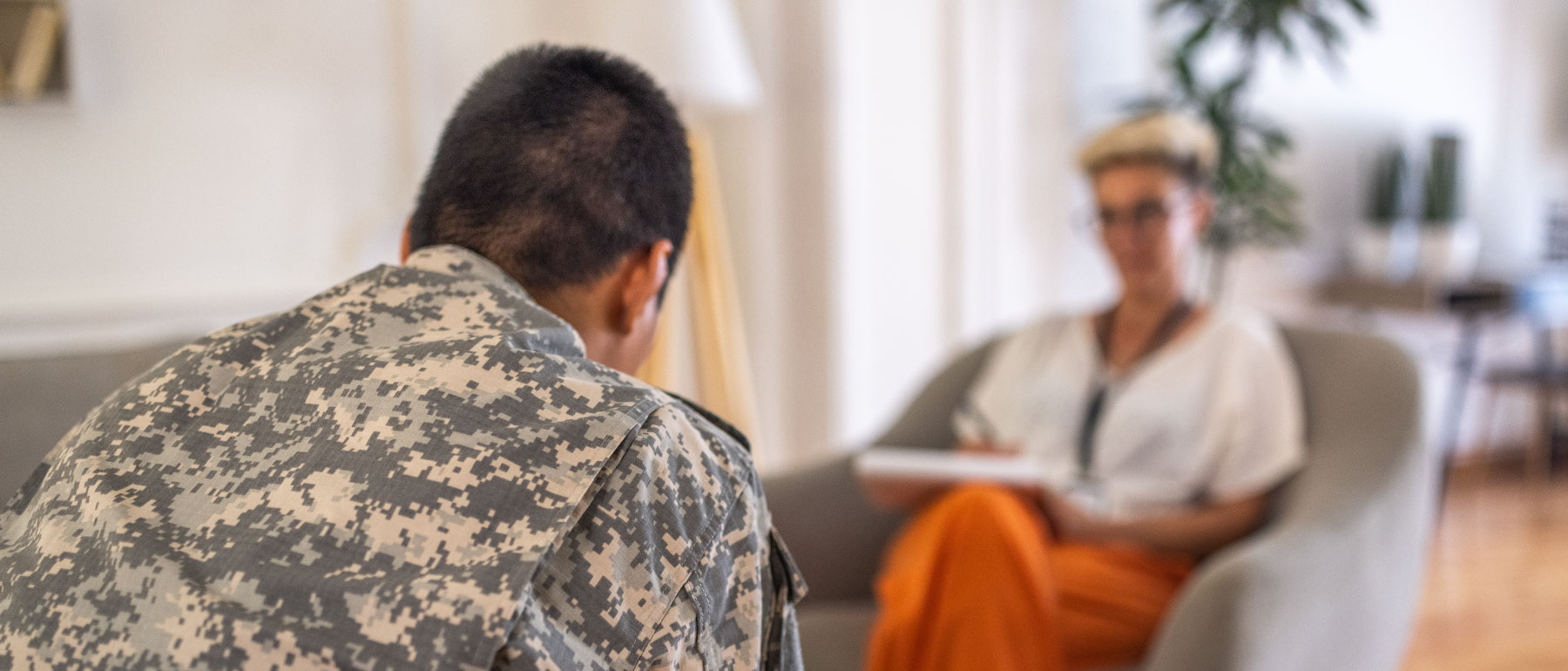 Veteran talking with a counselor at FHE Health